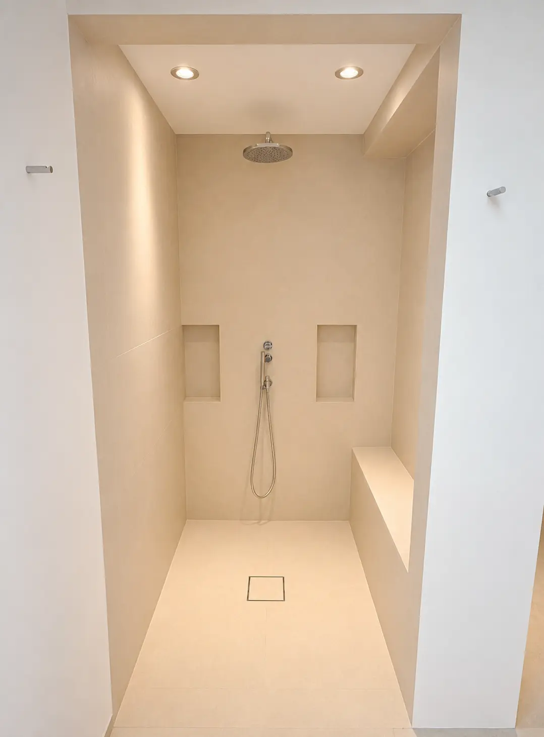Walk-in rain shower finished in warm stone
